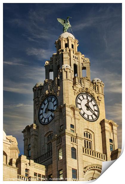 Historic clock tower against a blue sky with clouds, architectural detail, and a statue on top in Liverpool, UK. Print by Man And Life