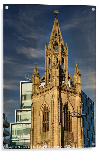 Gothic church spire against a blue sky with modern buildings in the background in Liverpool, UK. Acrylic by Man And Life