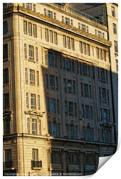 Sunlight casting shadows on a classic urban building facade during golden hour, highlighting architectural details in Liverpool, UK. Print by Man And Life