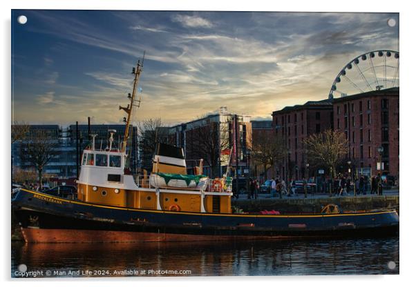 Tugboat in city harbor at sunset with ferris wheel and buildings in background in Liverpool, UK. Acrylic by Man And Life