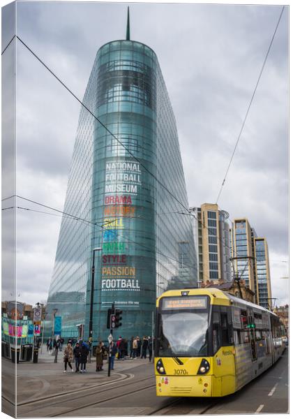 Tram passes the National Football Museum Canvas Print by Jason Wells