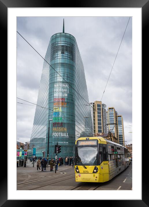 Tram passes the National Football Museum Framed Mounted Print by Jason Wells