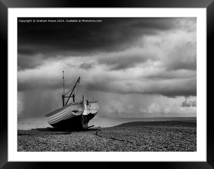 Beached fishing boat Framed Mounted Print by Graham Moore
