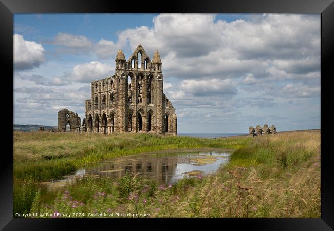 Whitby Abbey with reflection Framed Print by Paul Edney