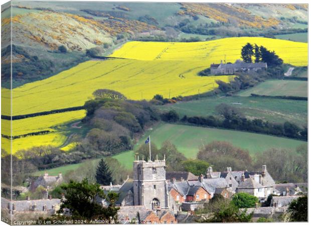 Corfe Village and yellow field  Canvas Print by Les Schofield