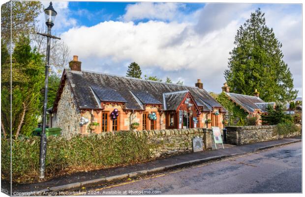 The Village Rest in Luss, Scotland Canvas Print by Angus McComiskey