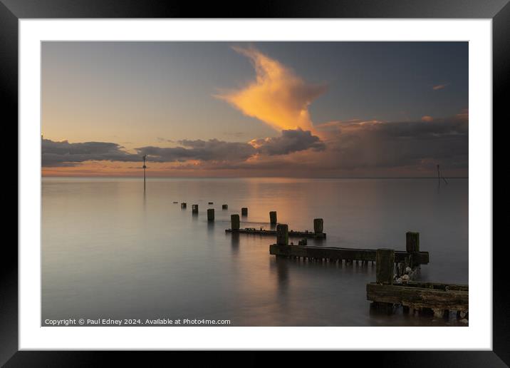 Hunstanton seafront golden clouds at sunset Framed Mounted Print by Paul Edney