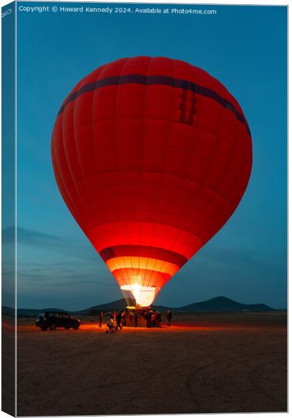Hot-Air Balloon preparing for take-off Canvas Print by Howard Kennedy