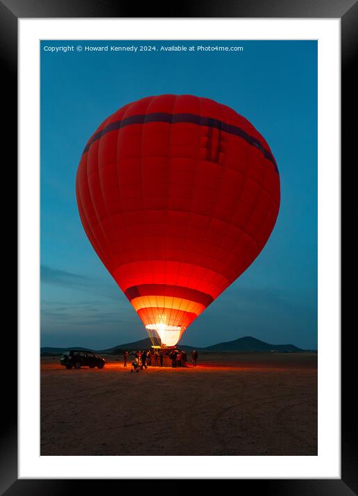 Hot-Air Balloon preparing for take-off Framed Mounted Print by Howard Kennedy