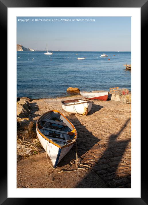 boats on the slipway at Swanage Framed Mounted Print by Derek Daniel
