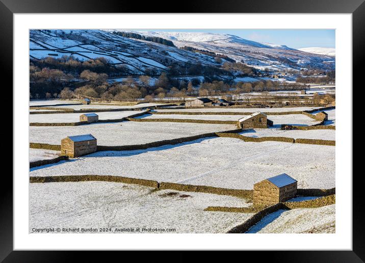 The Barns at Gunnerside in Swaledale on a bright, snowy winter's Framed Mounted Print by Richard Burdon