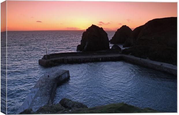 Sunset over Mullion Cove Canvas Print by Michael Hopes
