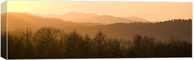 Mountains on fire Canvas Print by Ian Middleton