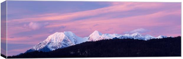 Panorama of the Kamnik Alps at sunset Canvas Print by Ian Middleton