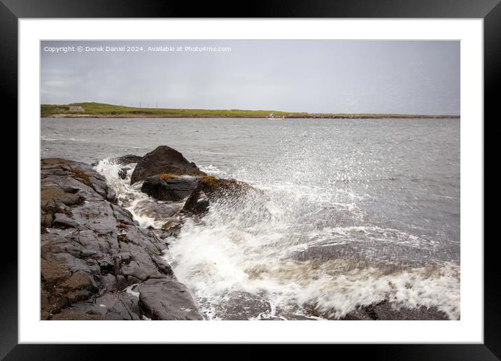 Waves crashing into the rocks at Staffin Bay Framed Mounted Print by Derek Daniel