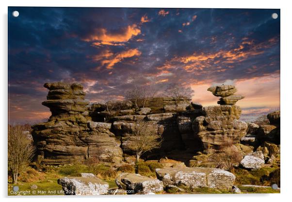 Dramatic sky at sunset over rugged rock formations in a serene landscape at Brimham Rocks, in North Yorkshire Acrylic by Man And Life