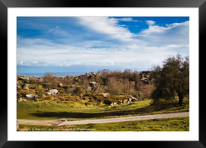 Idyllic rural landscape with lush green fields, scattered trees, and a clear blue sky with fluffy clouds at Brimham Rocks, in North Yorkshire Framed Mounted Print by Man And Life