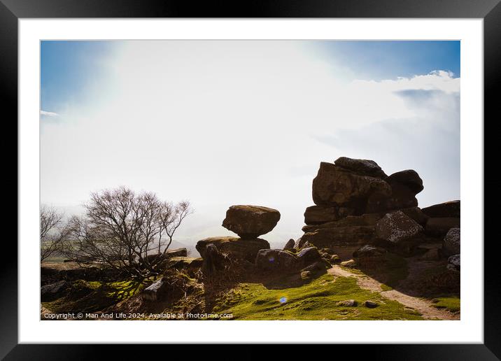Sunny landscape with silhouetted rock formations and a clear sky at Brimham Rocks, in North Yorkshire Framed Mounted Print by Man And Life