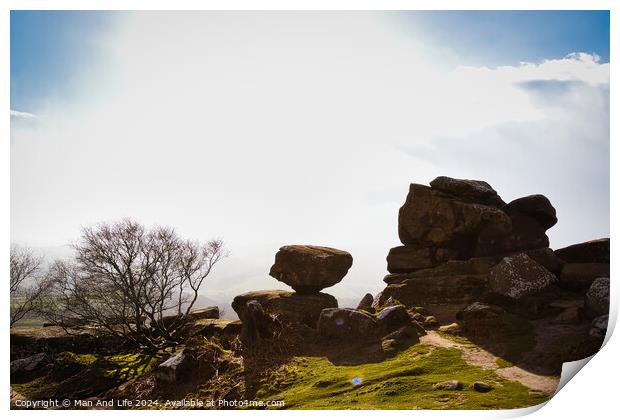 Sunny landscape with silhouetted rock formations and a clear sky at Brimham Rocks, in North Yorkshire Print by Man And Life