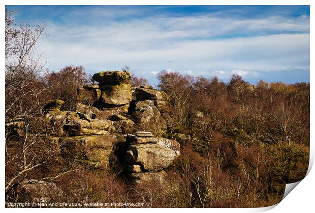 Rocky landscape with boulders and sparse vegetation under a cloudy sky at Brimham Rocks, in North Yorkshire Print by Man And Life