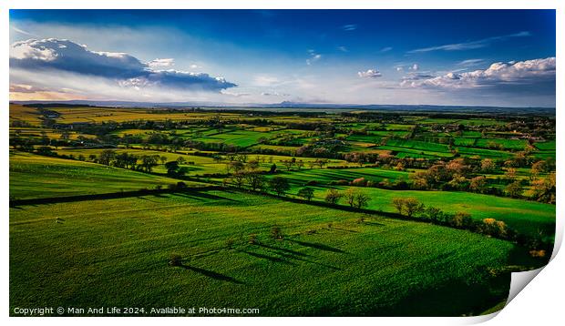 Aerial view of lush green countryside with fields and shadows cast by clouds, showcasing rural beauty in North Yorkshire. Print by Man And Life