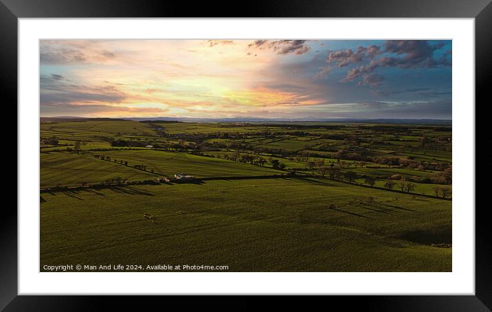 Aerial view of a lush green countryside under a dramatic sunset sky in North Yorkshire. Framed Mounted Print by Man And Life