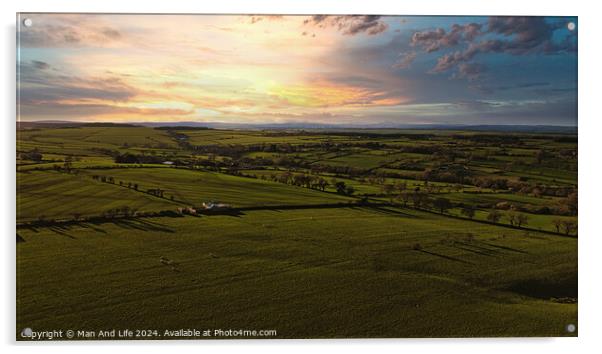 Aerial view of a lush green countryside under a dramatic sunset sky in North Yorkshire. Acrylic by Man And Life