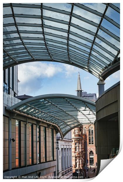 Modern glass canopy over a pedestrian walkway with historic architecture in the background on a sunny day in Leeds, UK. Print by Man And Life