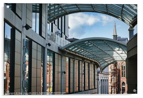 Modern glass-covered walkway with urban architecture and blue sky in the background in Leeds, UK. Acrylic by Man And Life