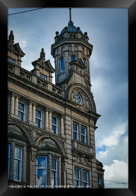 Vintage clock tower on an old European-style building against a cloudy sky in Leeds, UK. Framed Print by Man And Life