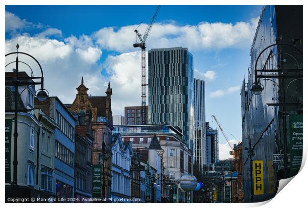 Urban cityscape with historic buildings and modern skyscraper under construction against a blue sky with clouds in Leeds, UK. Print by Man And Life