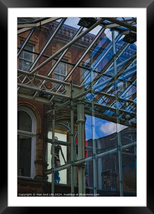Urban contrast with old brick building and modern glass structure, reflecting city life and architectural diversity in Leeds, UK. Framed Mounted Print by Man And Life