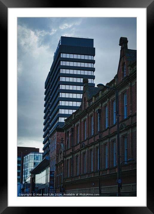 Contrast of old and new architecture with a modern skyscraper towering behind a classic brick building under a cloudy sky in Leeds, UK. Framed Mounted Print by Man And Life