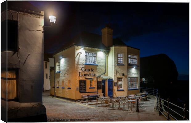 The Cod and Lobster pub in Staithes. Canvas Print by Chris North