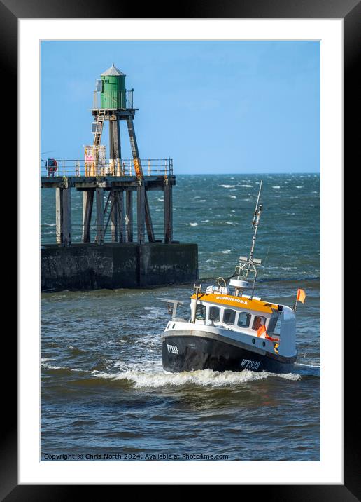 Nearly Home. A local fishing boat returns to safe  Framed Mounted Print by Chris North