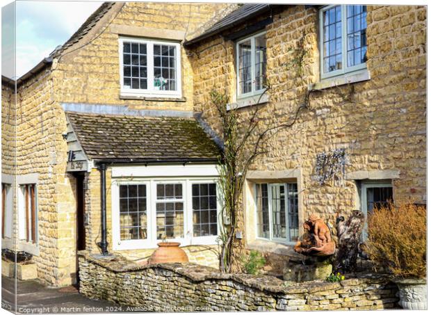 Cotswolds corner cottage Bourton on the water Canvas Print by Martin fenton