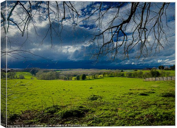 Sunshine and showers Canvas Print by Ian Donaldson