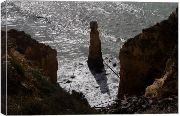 Algarve Coast With Steeple Rock In The Ocean Canvas Print by Artur Bogacki