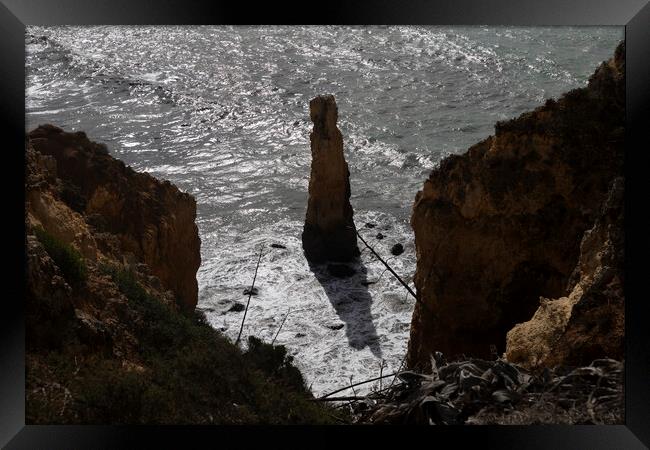 Algarve Coast With Steeple Rock In The Ocean Framed Print by Artur Bogacki