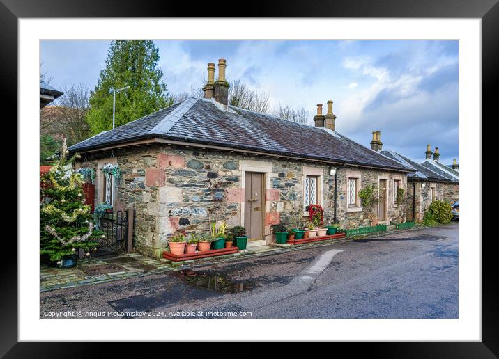 Cottages on Pier Road in Luss, Scotland Framed Mounted Print by Angus McComiskey
