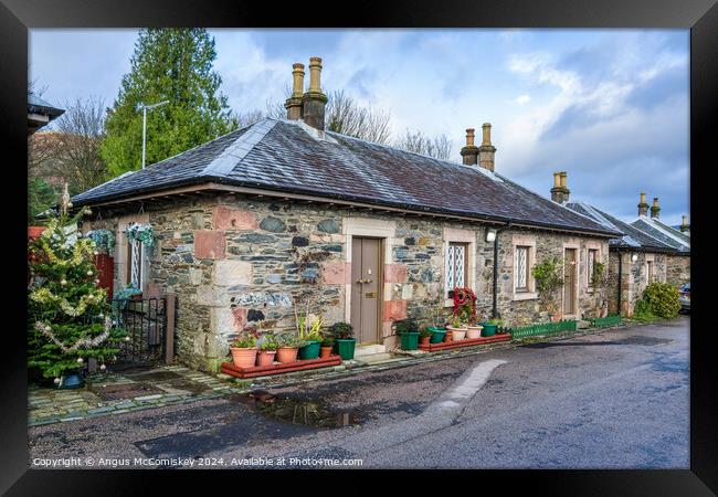 Cottages on Pier Road in Luss, Scotland Framed Print by Angus McComiskey