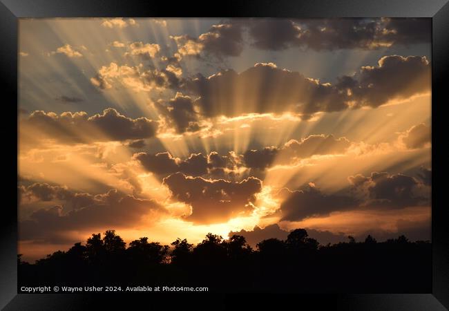Glorious Sunset shining Golden Rays of Light Framed Print by Wayne Usher