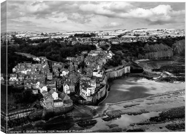 Robin Hoods Bay in snow monochrome Canvas Print by Graham Moore