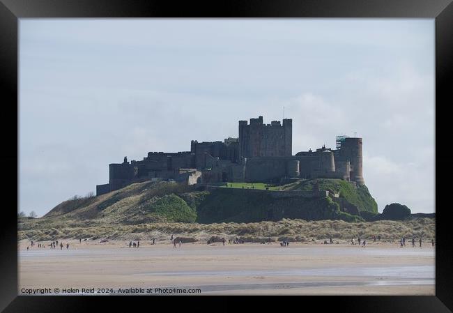 Bamburgh Castle Framed Print by Helen Reid