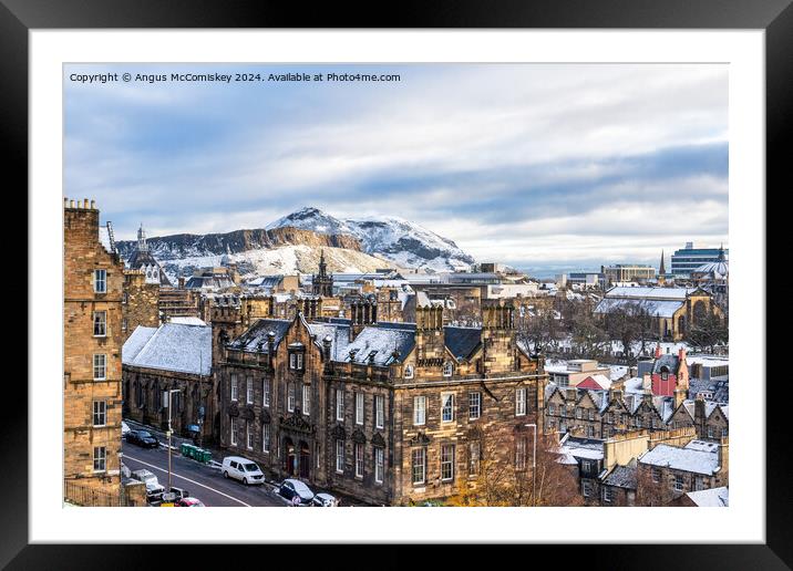 Salisbury Crags and Edinburgh skyline in snow Framed Mounted Print by Angus McComiskey