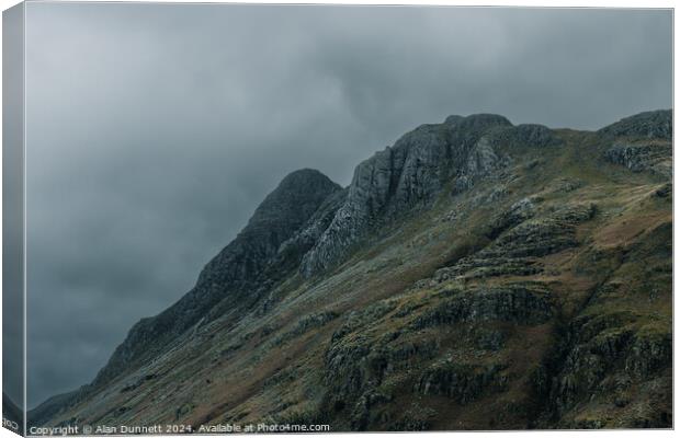 Langdale Pikes in shade Canvas Print by Alan Dunnett