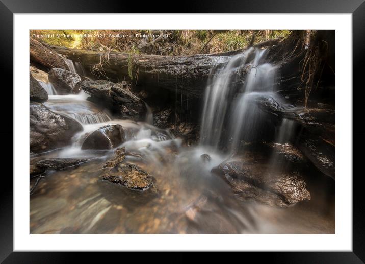 Water Over Log Framed Mounted Print by Ronnie Reffin
