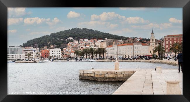Split Town walking by the water front Framed Print by Holly Burgess
