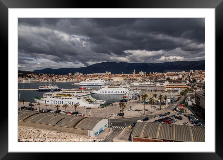 Looking from the cruise ship to Spilt Town on a dark cloudy day  Framed Mounted Print by Holly Burgess