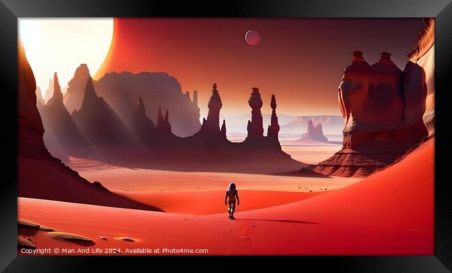 A lone astronaut explores a vast alien desert with towering rock formations under a large red sun and a distant planet, conveying exploration and adventure on an extraterrestrial world. Framed Print by Man And Life